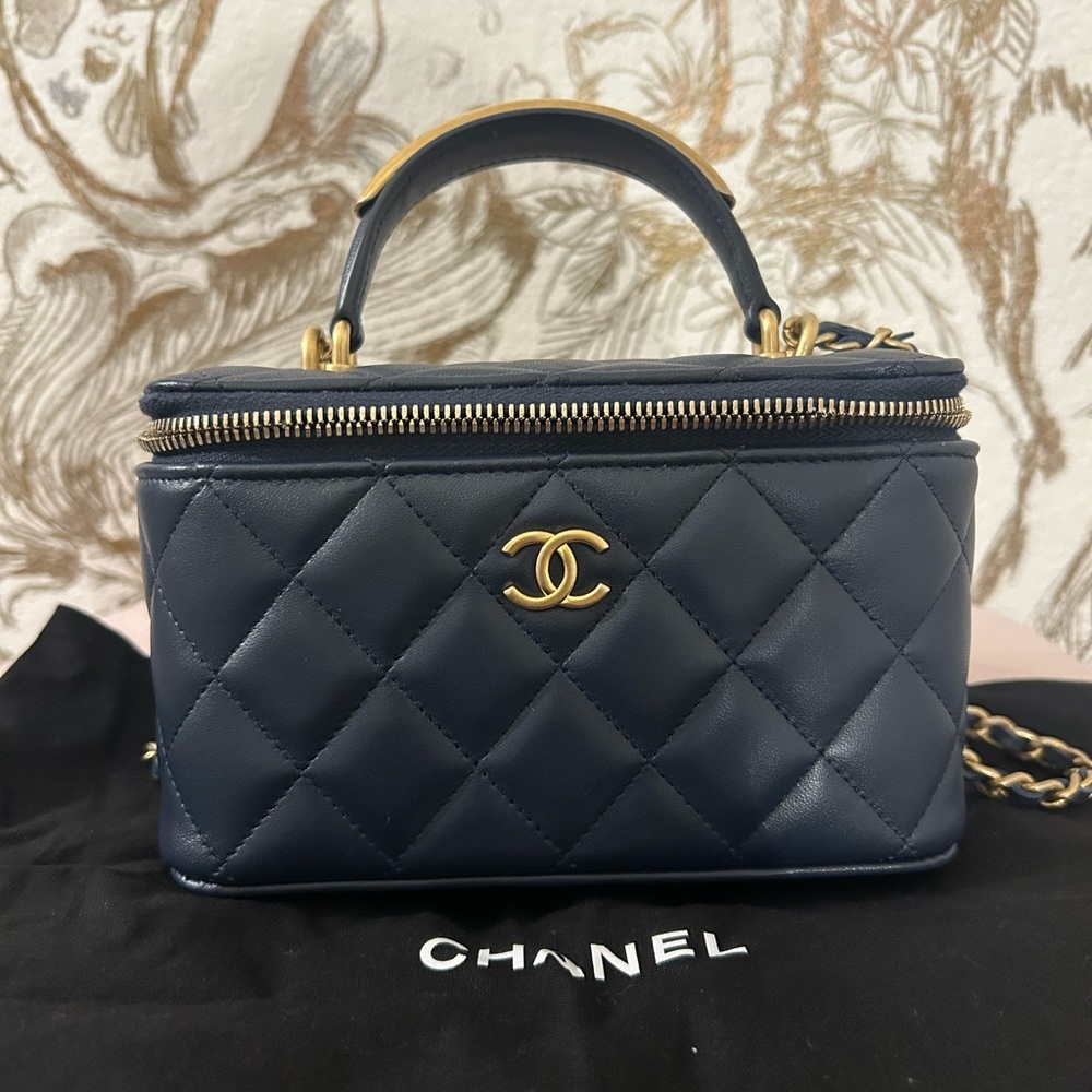 CHANEL Blue Quilted Cosmetic Bag with Gold Hardware